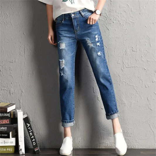 Trendy Distressed Boyfriend Jeans - Sleek Urban Denim with Edgy Ripped Accents
