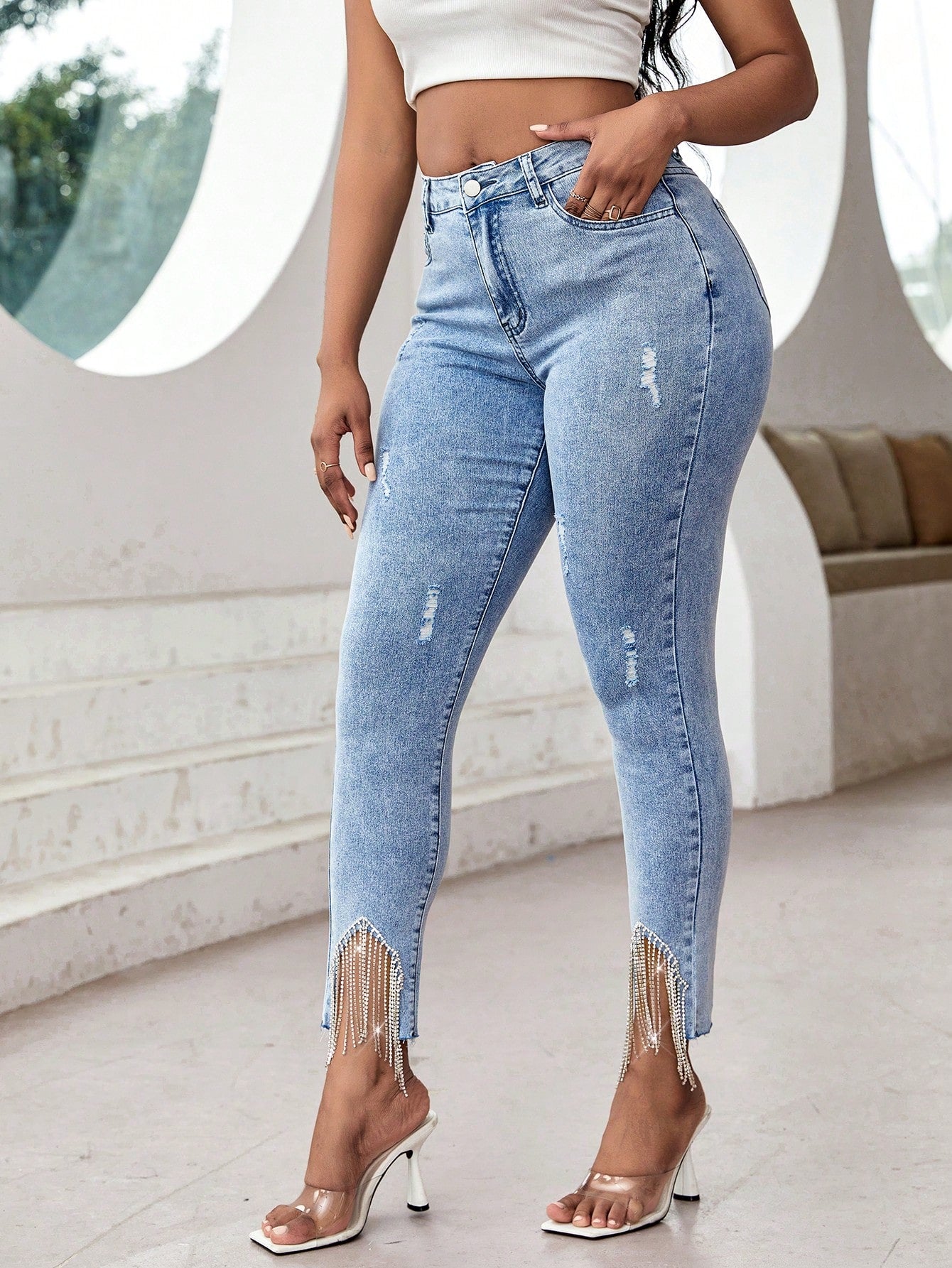 Ripped Rhinestone Fringe Hem Skinny Jeans: The Perfect Blend of Glam and Edgy