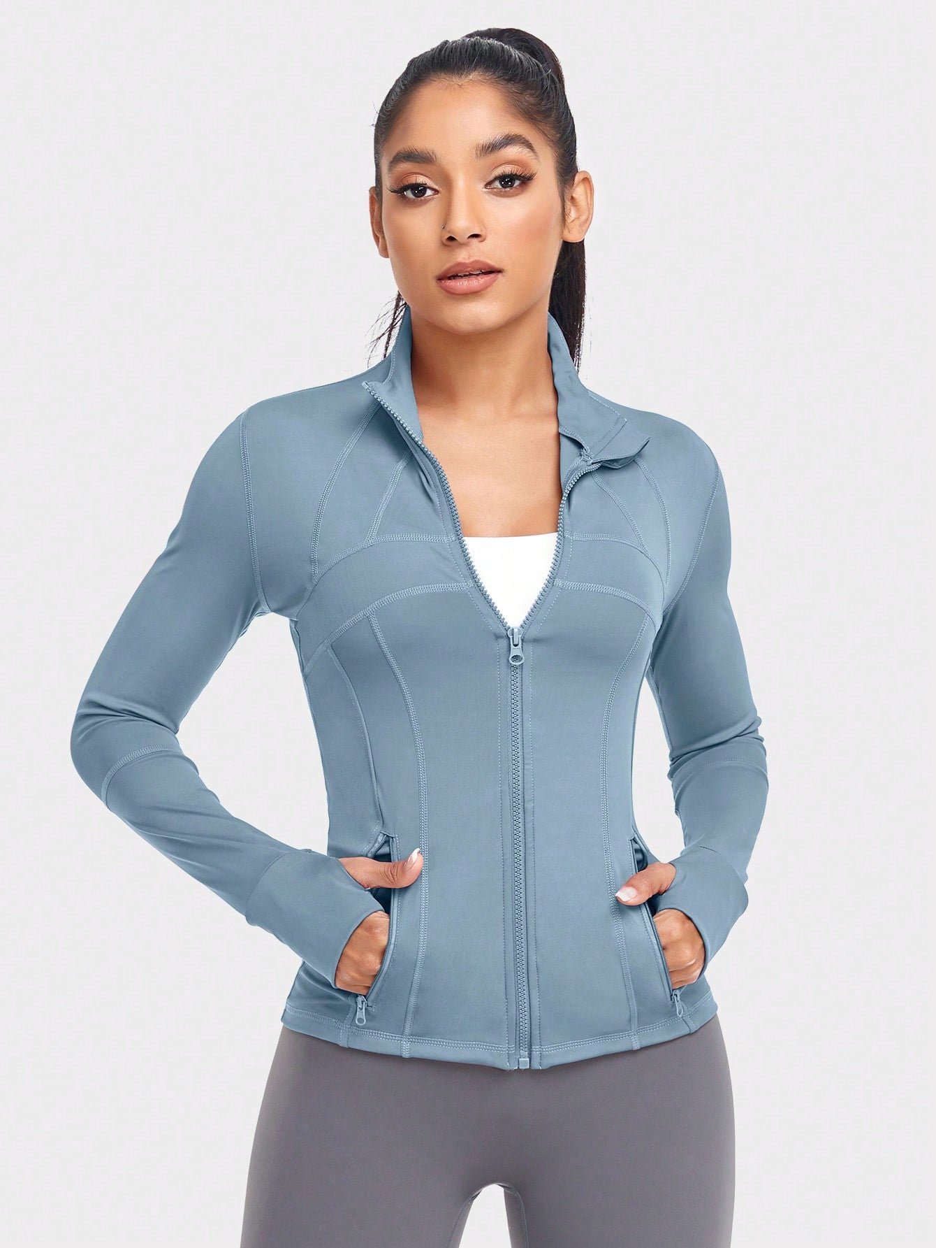 Women's Athletic Sports Jacket: Dual Zip Pockets & Thumb Hole Design