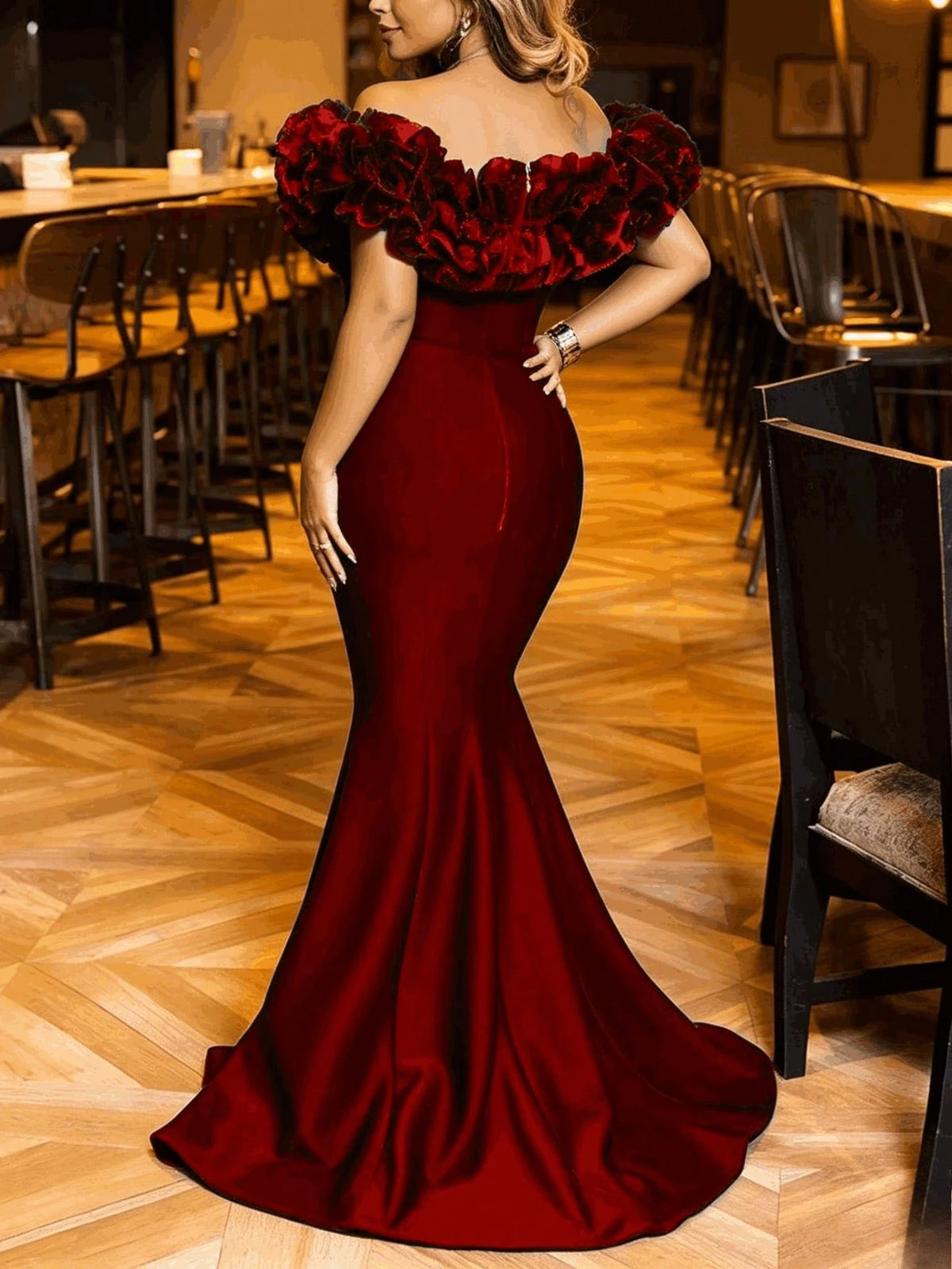 Red off-shoulder ruffle mermaid gown, back view