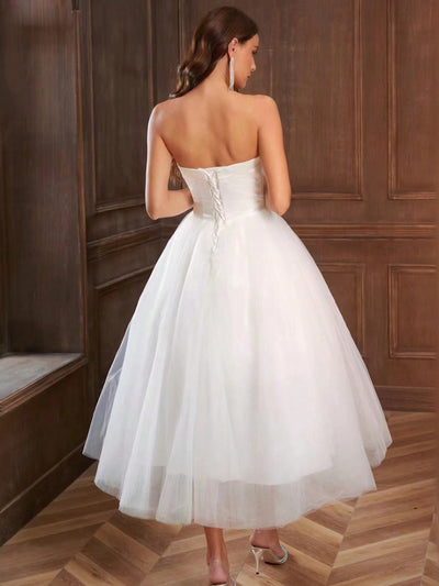 Elegant Allure: Solid Mesh Strapless Wedding Dress